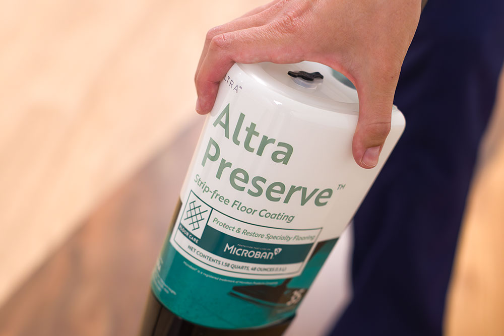 Altra Preserve bottle being added to applicator